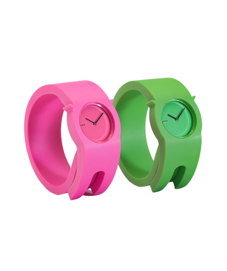 Two plastic wraparound wristwatches, one in pink, one in green, with matching-colored faces and metal hands.
