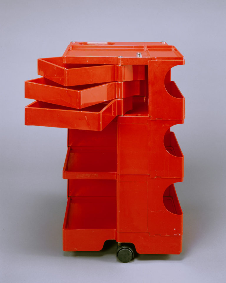 Red plastic storage cart on black wheels with multiple shelves, compartments, and swiveling drawers.
