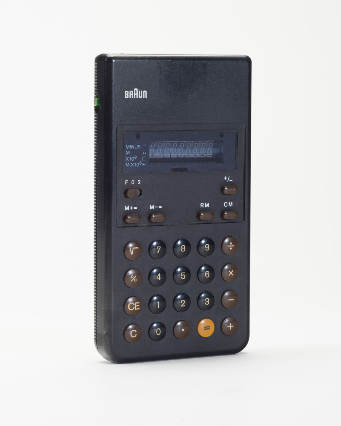 Black handheld calculator with digital display, brown switches, brown and black buttons with white markings, and a yellow button with a black equal sign.